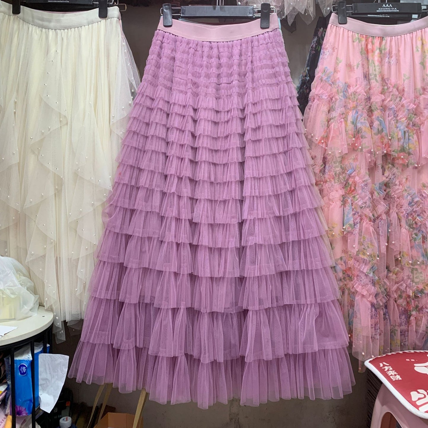 A woman in a lace cake skirt