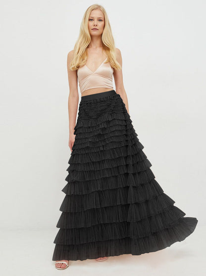 A woman in a lace cake skirt